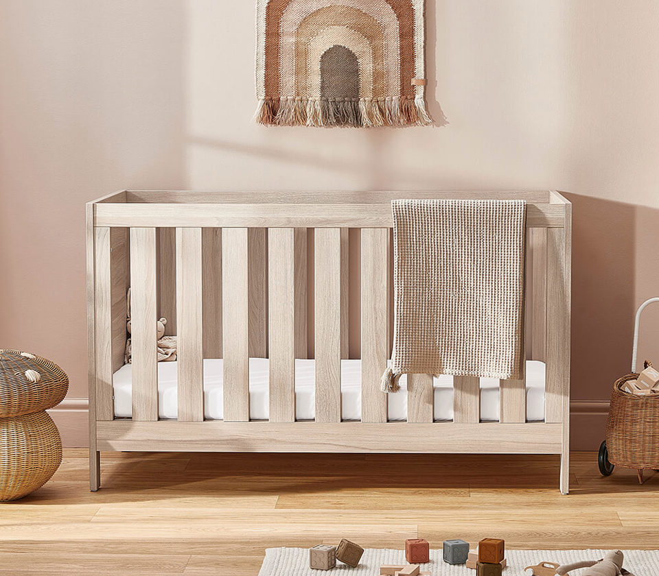 View Silver Cross Bromley Oak convertible cot bed to toddler bed information